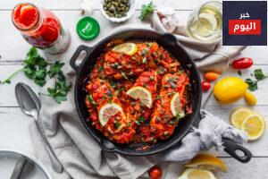 عمل سمك بالطماطم